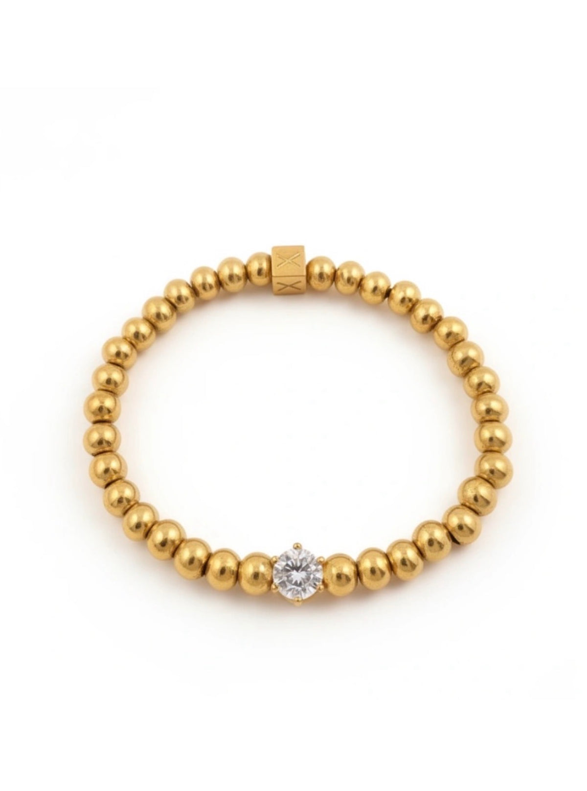Elegant gold bead bracelet featuring a single sparkling crystal accent, part of The Timeless Collection – Aurea Claritas, showcasing luxury handcrafted jewelry by Atelier X.