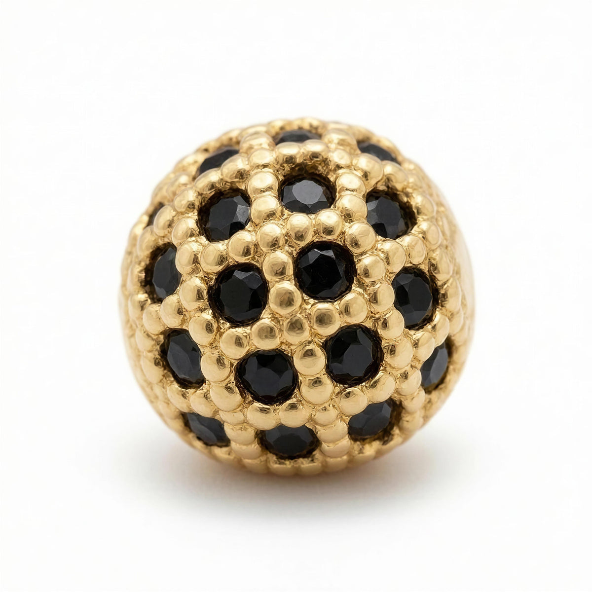 Obsidia Lux features an intricately crafted gold bead adorned with faceted black stones, combining luxury and elegance in a unique designer bracelet element.